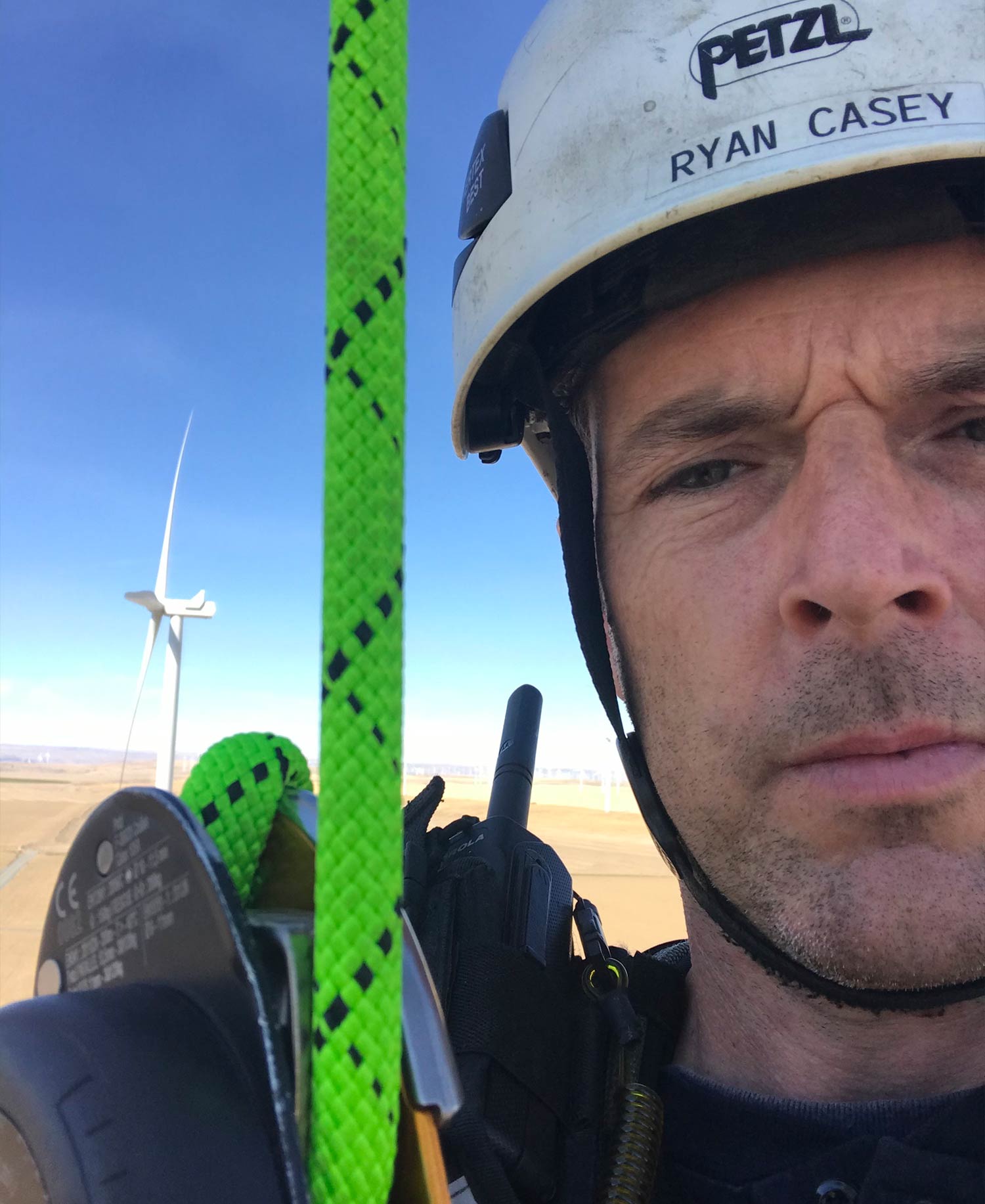 rope access work in canada,  man on wind turbine